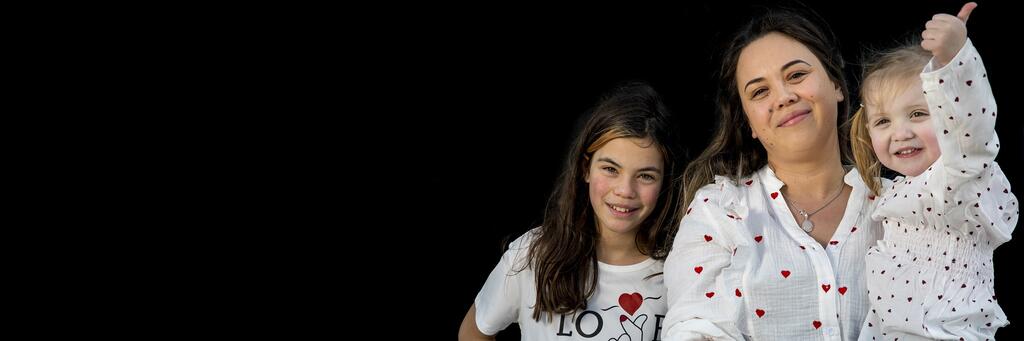 Foto van Kenny en haar kinderen bij het verhaal over haar bloedtransfusie.